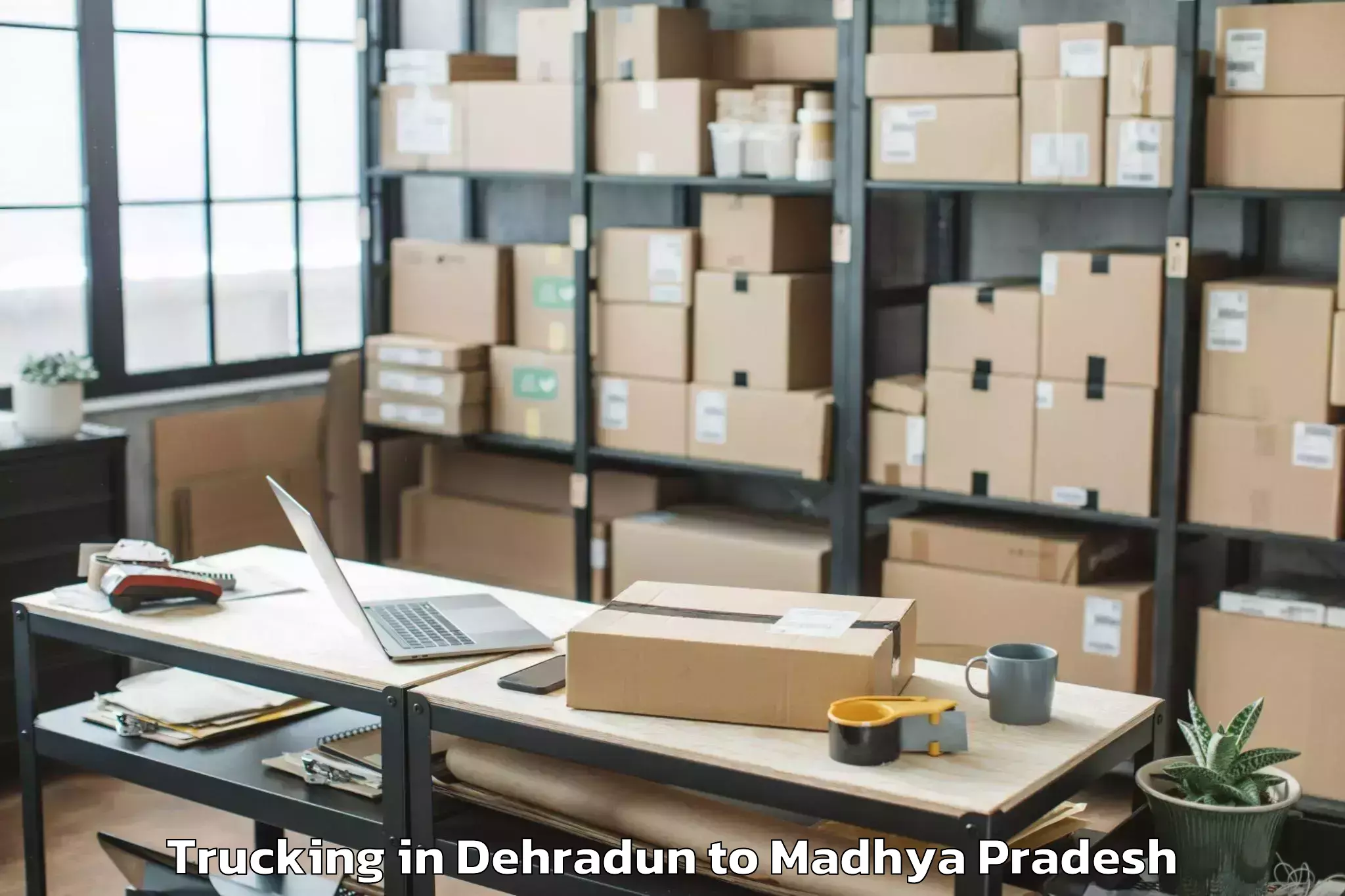 Book Dehradun to Malhargarh Trucking Online